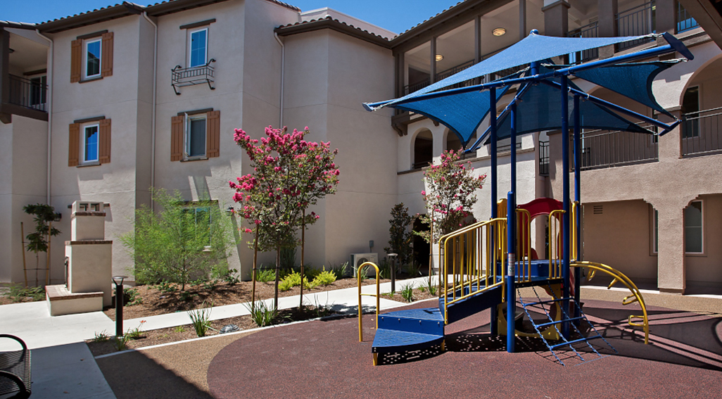 Verano apartments outdoor play equipment area