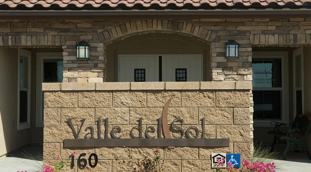 Valle del Sol apartments building and monument sign