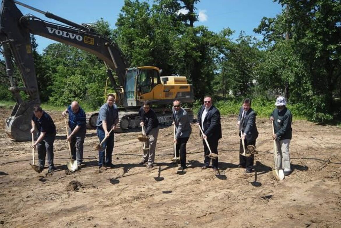 Parkdale Villas groundbreaking ceremony photo with men and shovels