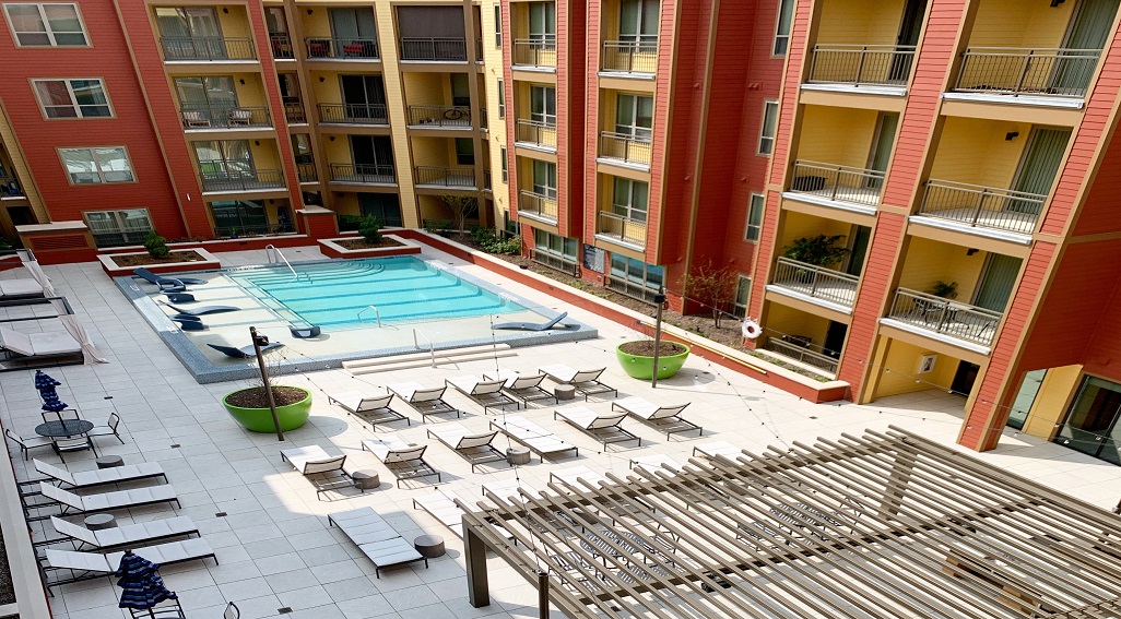 Upper level view of pool and courtyard at Florence at the Harbor